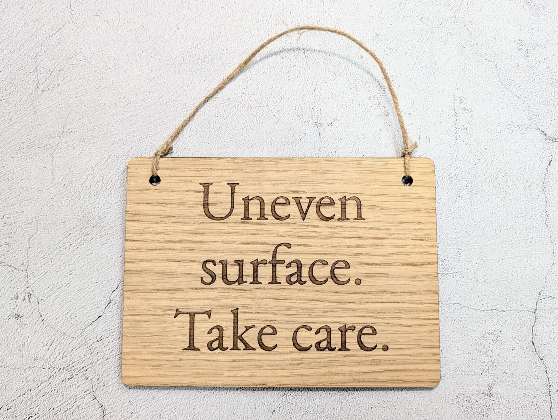 Uneven Surface Take Care Sign – Oak Veneered Wooden Hanging Sign, Personalised Text Option, Handmade in Wales, Eco Packaging - 4 Sizes - CherryGroveCraft