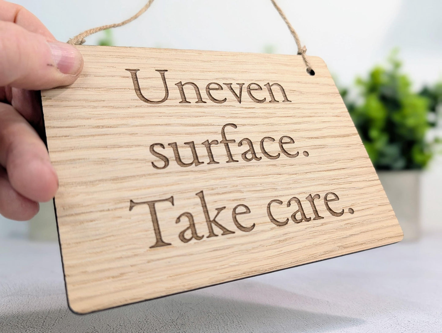 Uneven Surface Take Care Sign – Oak Veneered Wooden Hanging Sign, Personalised Text Option, Handmade in Wales, Eco Packaging - 4 Sizes - CherryGroveCraft