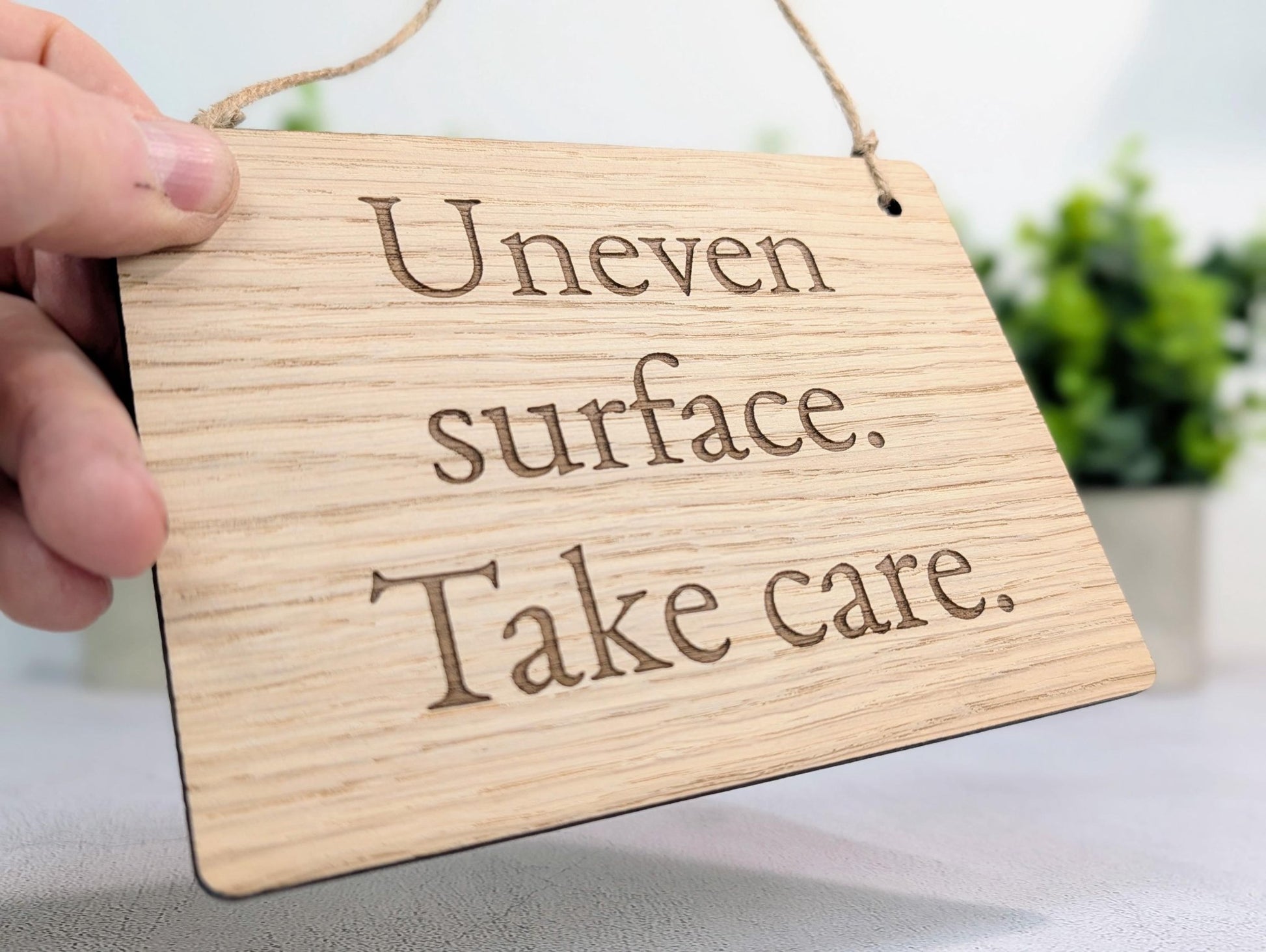 Uneven Surface Take Care Sign – Oak Veneered Wooden Hanging Sign, Personalised Text Option, Handmade in Wales, Eco Packaging - 4 Sizes - CherryGroveCraft