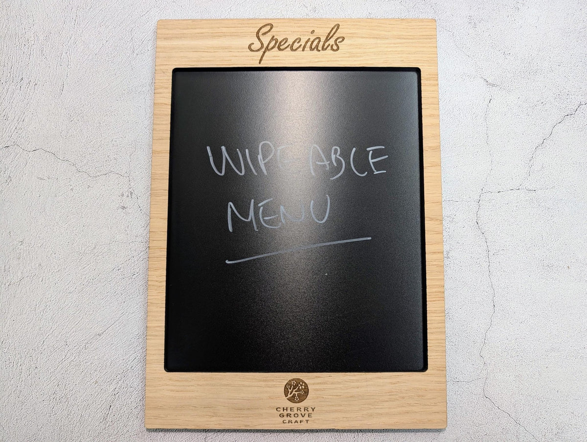 Wipeable specials board — laser engraved oak heading detail