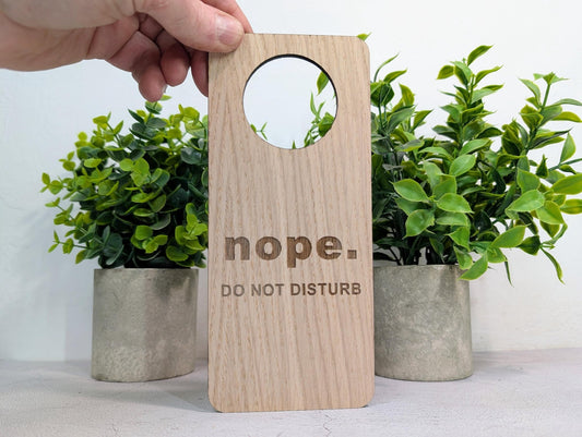 Yep / Nope door hanger — nope, do not disturb side, oak veneered MDF