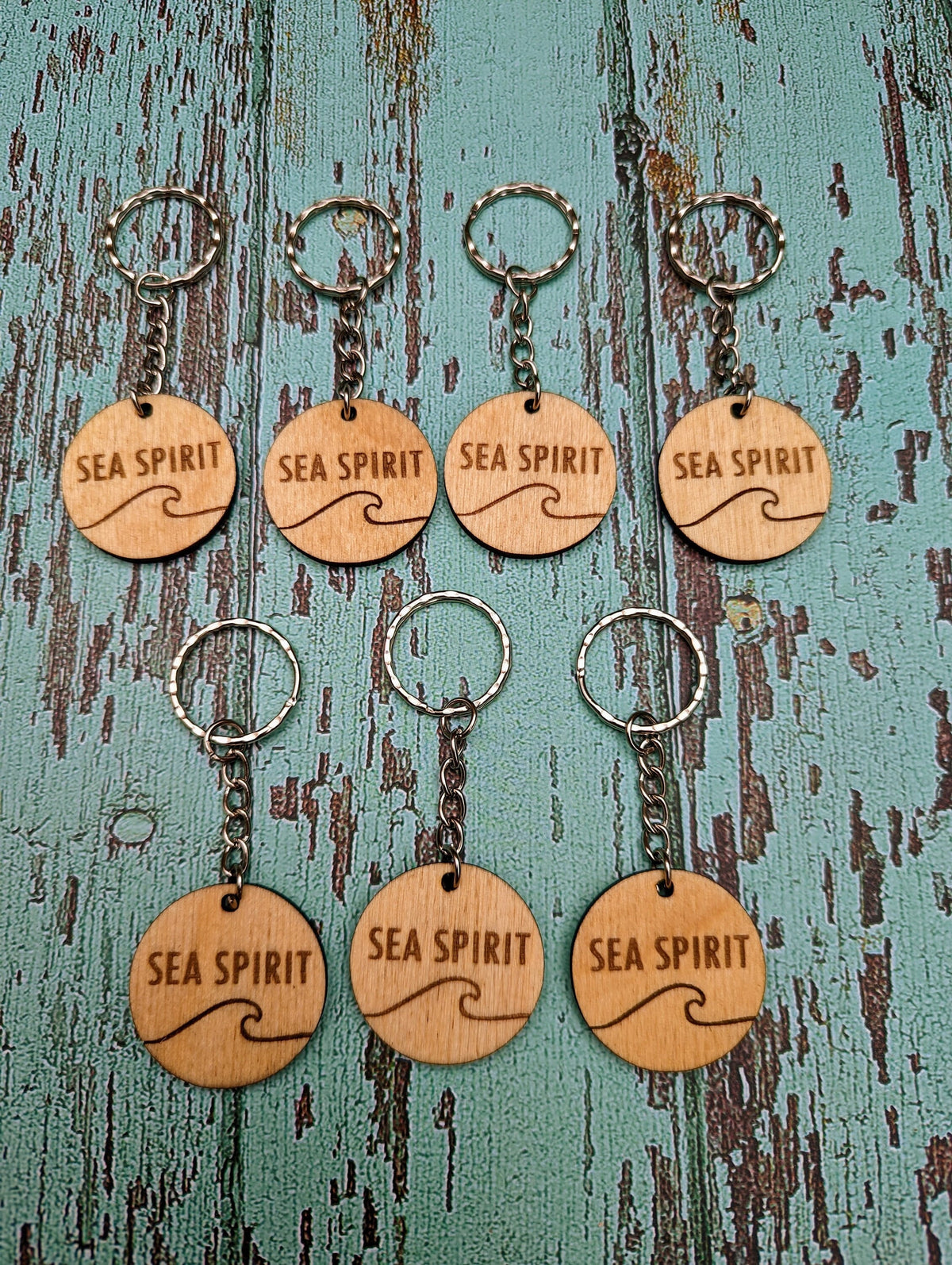 Branded wooden swing tags — 35mm birch, logo engraved, Danish oil, with or without keychain